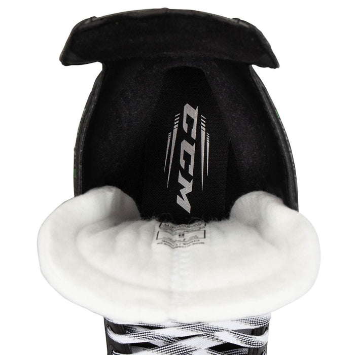 Black skates with green features. White laces. 