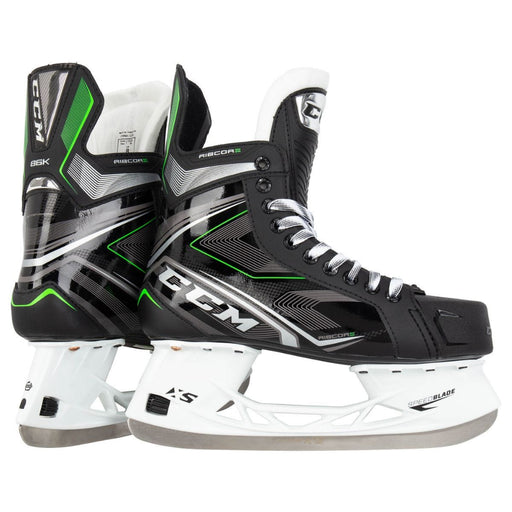 Black skates with green features. White laces. 
