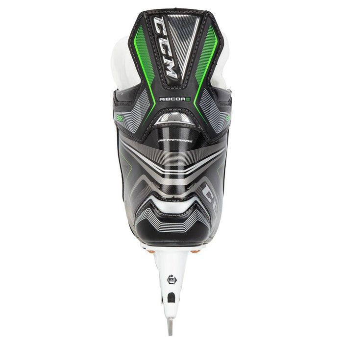 Black skates, with small green features. White laces and black lining