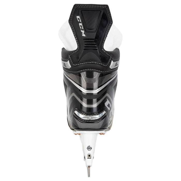 Black skates, with small green features. White laces and black lining