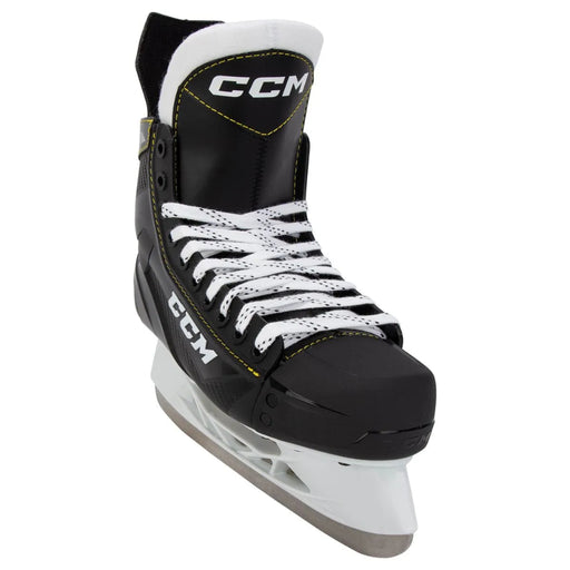 Black skates with yellow trim and white laces