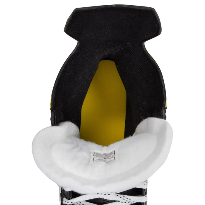 Black skates with yellow trim and white laces