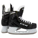 Black skates with yellow trim and white laces