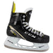 Black skates with gold accents, white laces and yellow lining