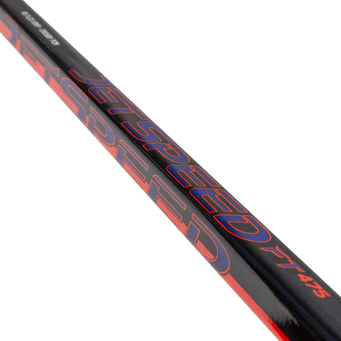 Black stick with red detail and blue highlights