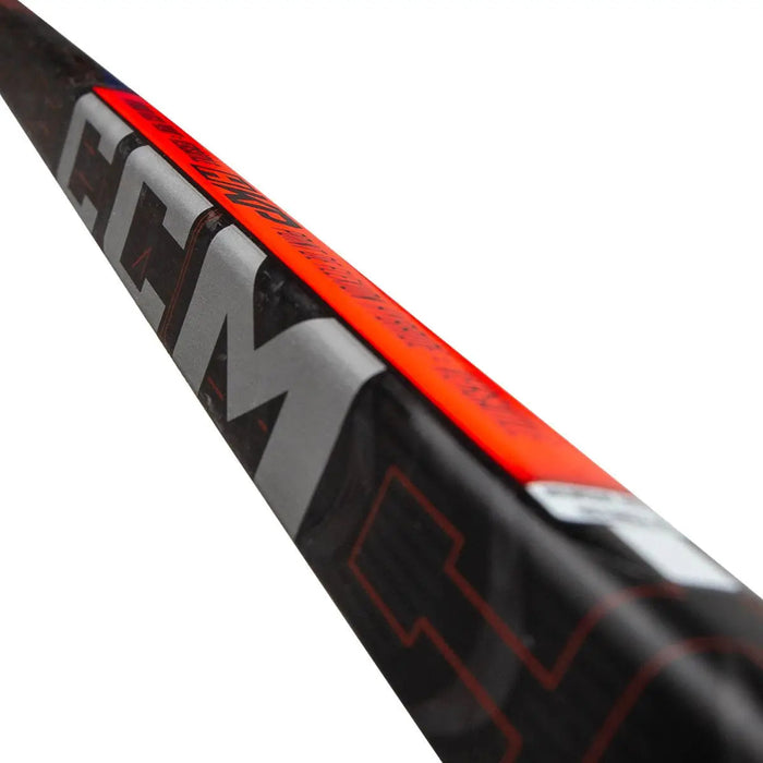 black stick with red text and details