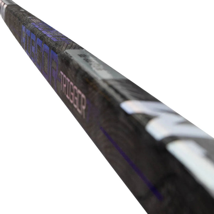 black stick with purple text
