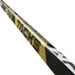 Black stick with yellow blade and details