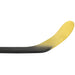 Black stick with yellow blade and details