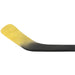 Black stick with yellow blade and details