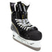 Black skates with gold accents, white laces and black lining